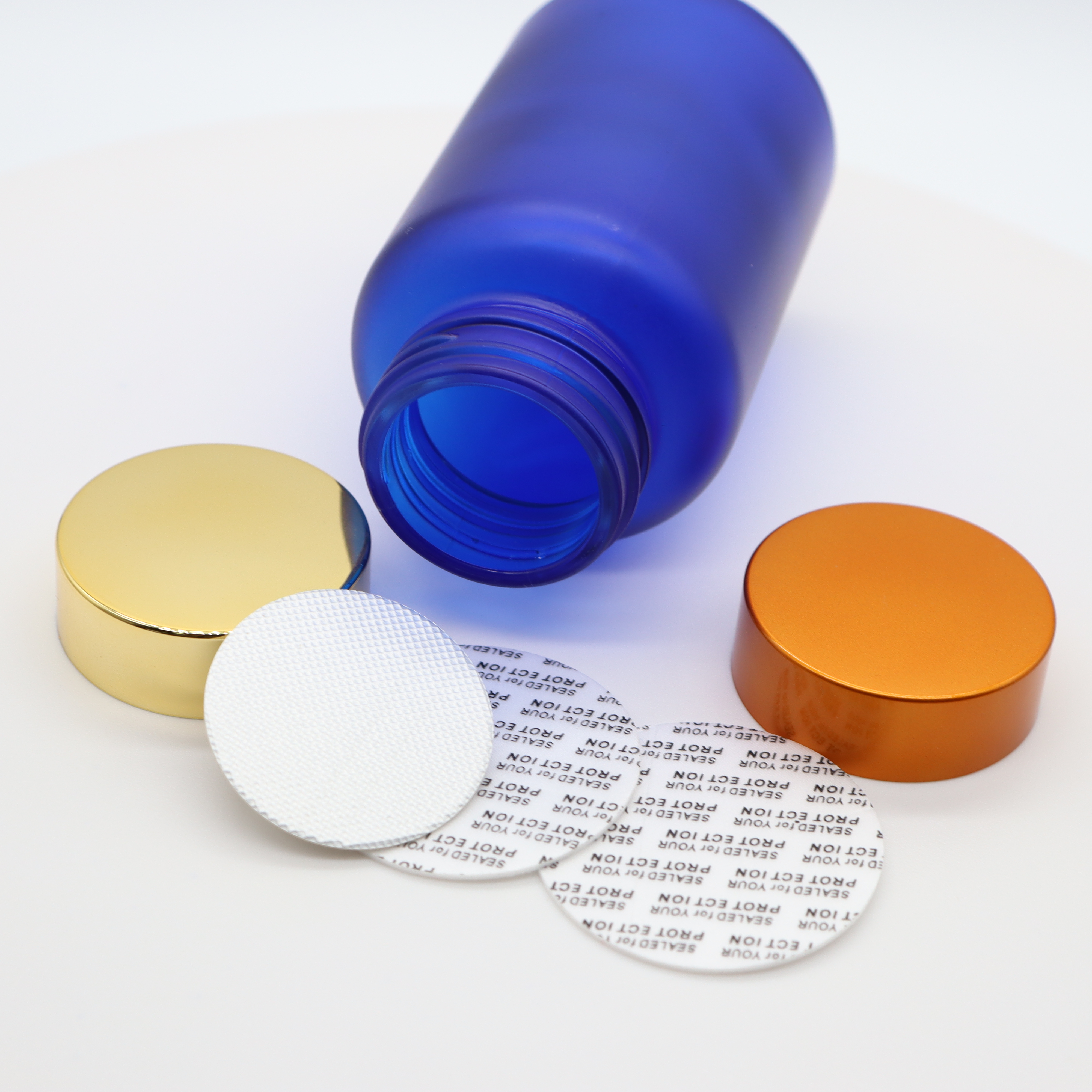 Glass pill bottle with seals and caps